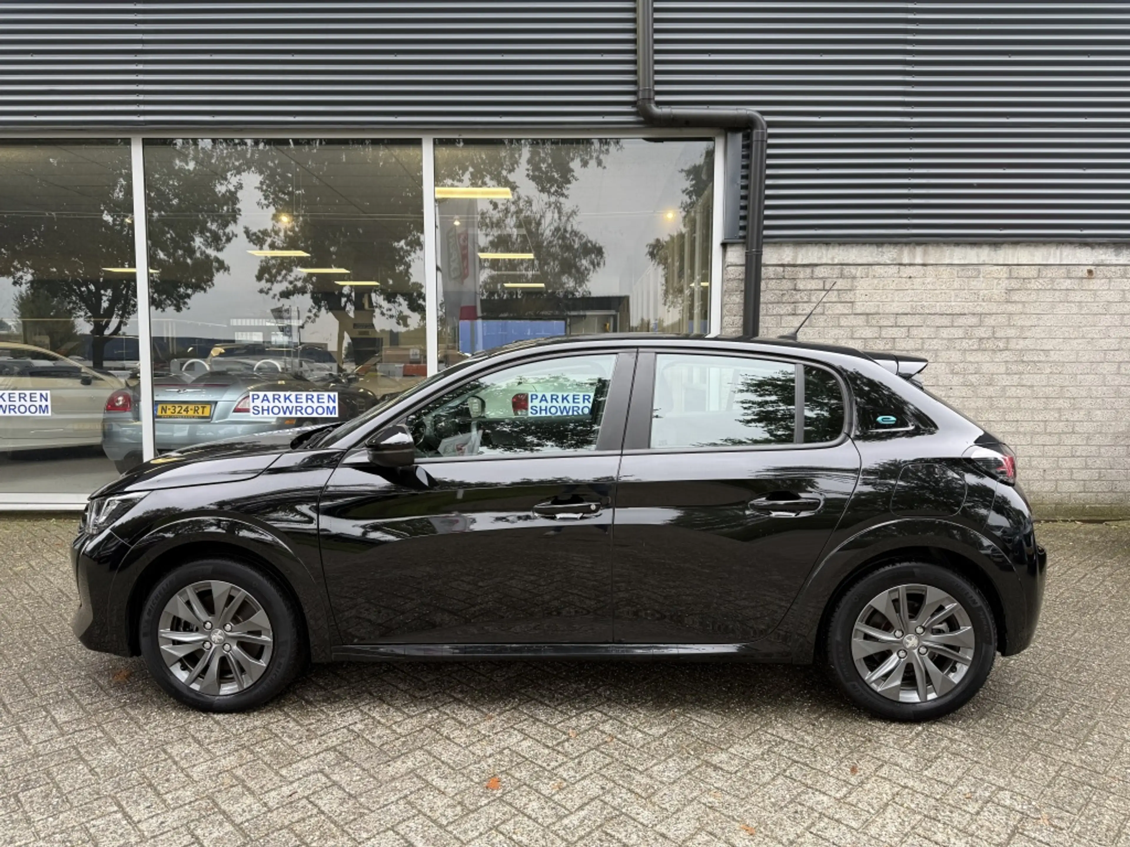 Peugeot e-208 Active Pack 50 kWh SOH 95 Stoelverwarming/Navi/Car — photo 3