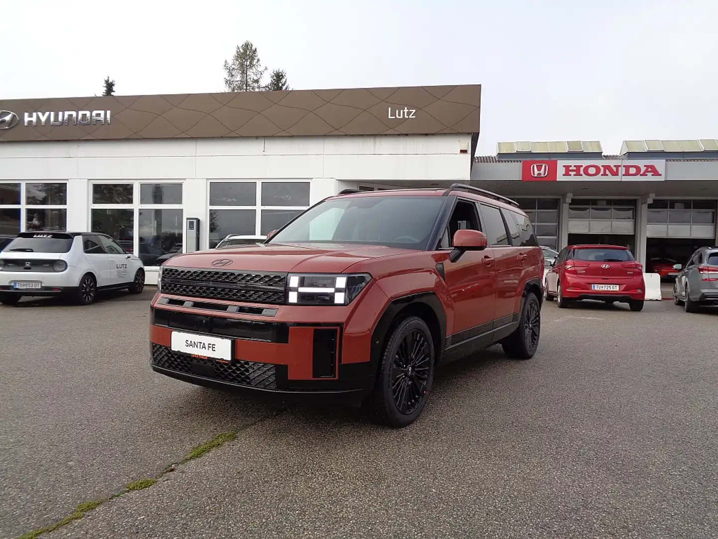 Hyundai SANTA FE Santa Fe 1,6 T-GDI Hybrid 4WD Calligraphy Aut. Orange - 1