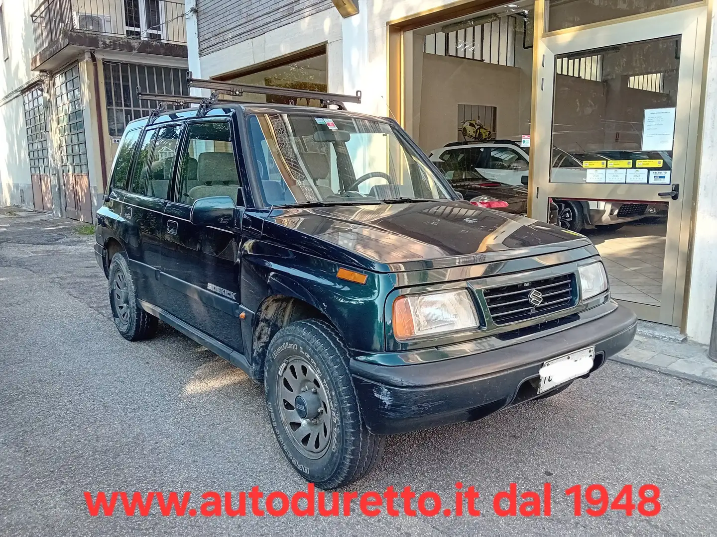 Suzuki Vitara Sidekick Passo Lungo 5p 1.6i 16v JLX Grün - 1