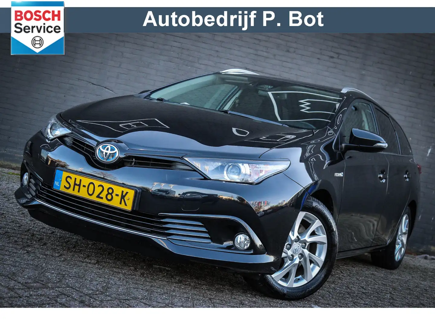 Toyota Auris Touring Sports 1.8 Hybrid Dynamic Trekhaak/Navi/Ca Noir - 1
