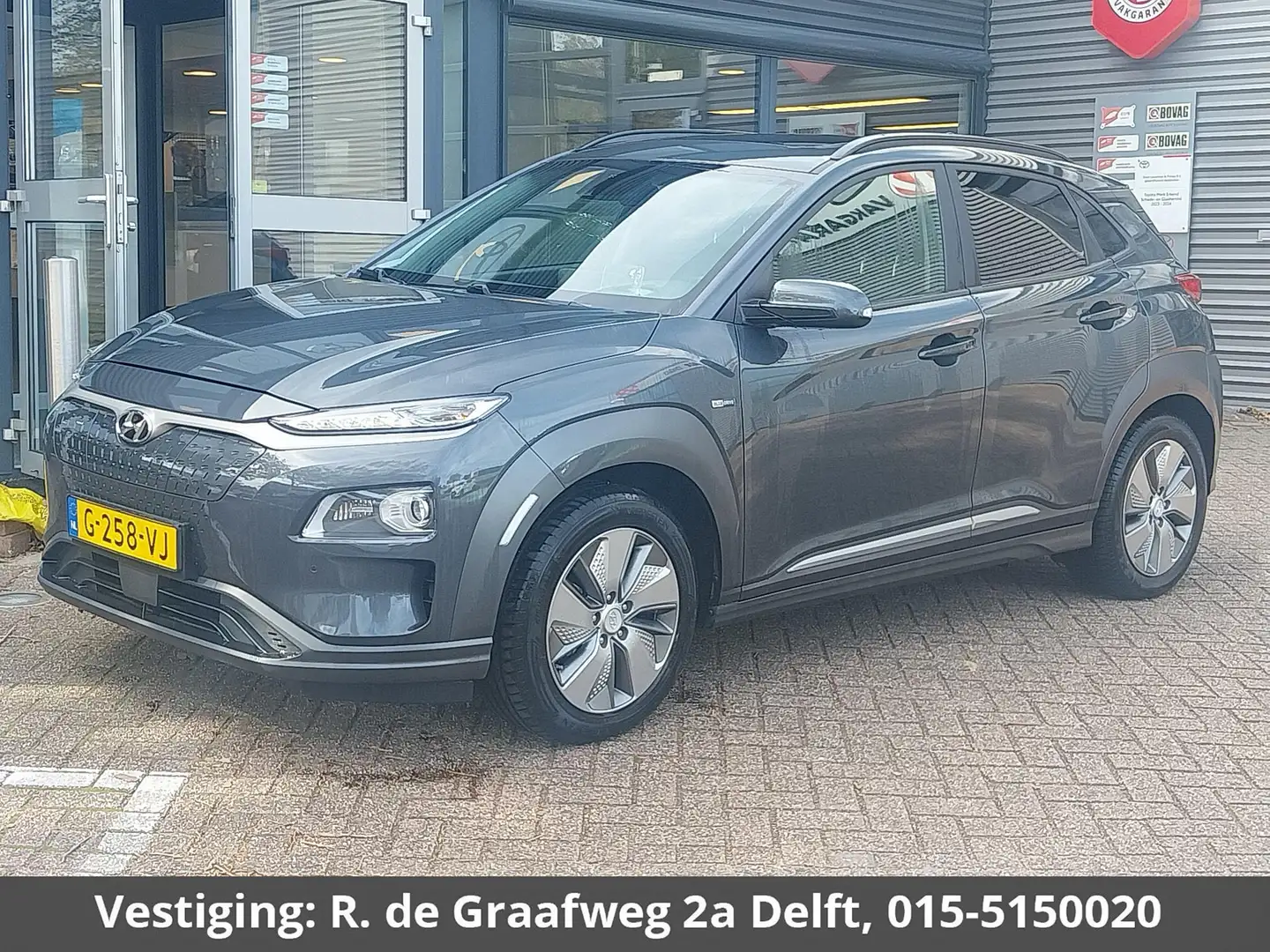 Hyundai KONA EV Premium 64 kWh | Navigatie | Schuif-/Kanteldak Grijs - 1