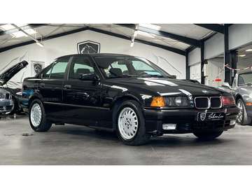 SERIE 318i iS BERLINE E36 / 1ERE MAIN / HISTORIQUE