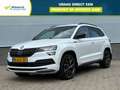 Skoda Karoq 1.5 TSI 150 pk DSG Sportline Business | 19" | trek Weiß - thumbnail 1