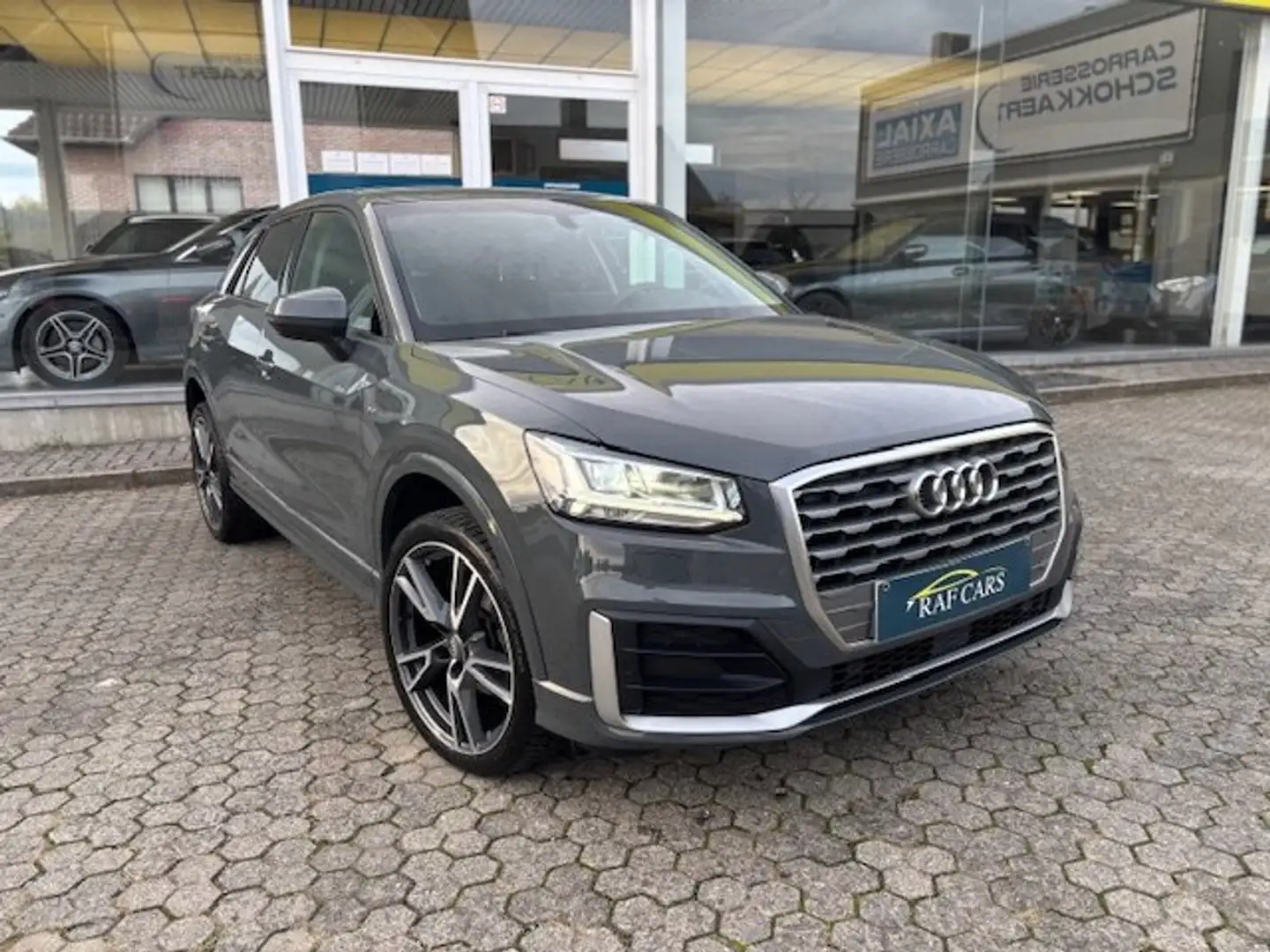 Audi Q2 Q2 35 TFSI S tronic S line | GARANTIE | CARPASS! | Grijs - 2