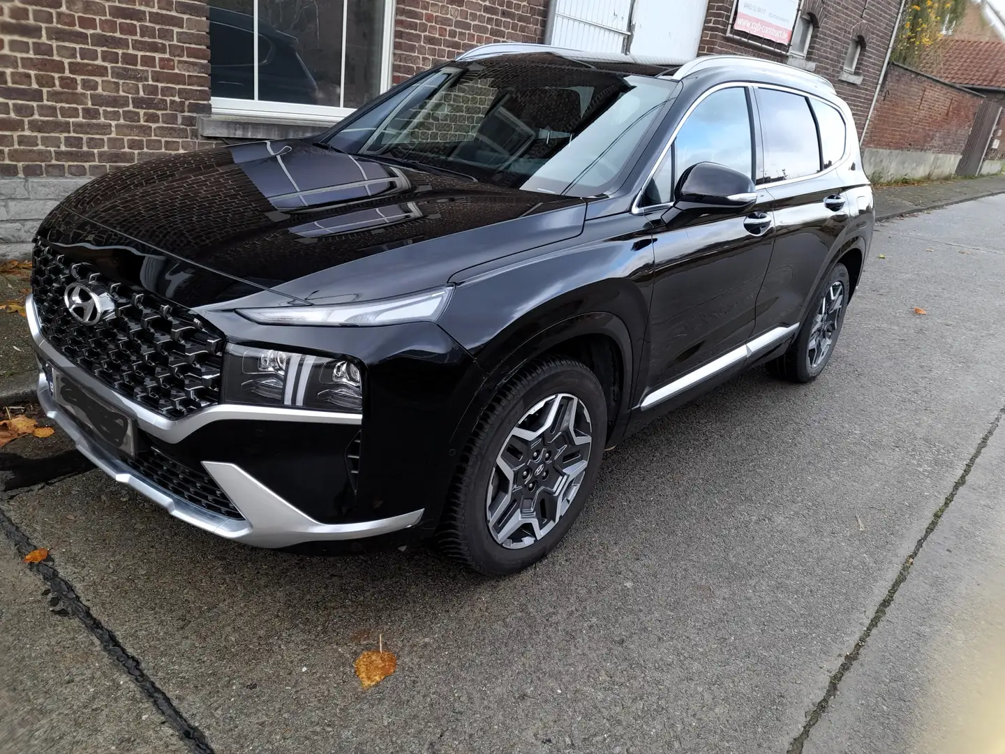 Hyundai SANTA FE 1.6 T-GDi 4WD Shine Family Sensation Luxury Zwart - 1