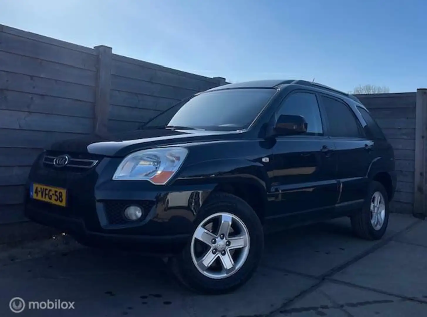 Kia Sportage 2.0 CRDI X-ecutive GrijsKenteken YoungT - 1