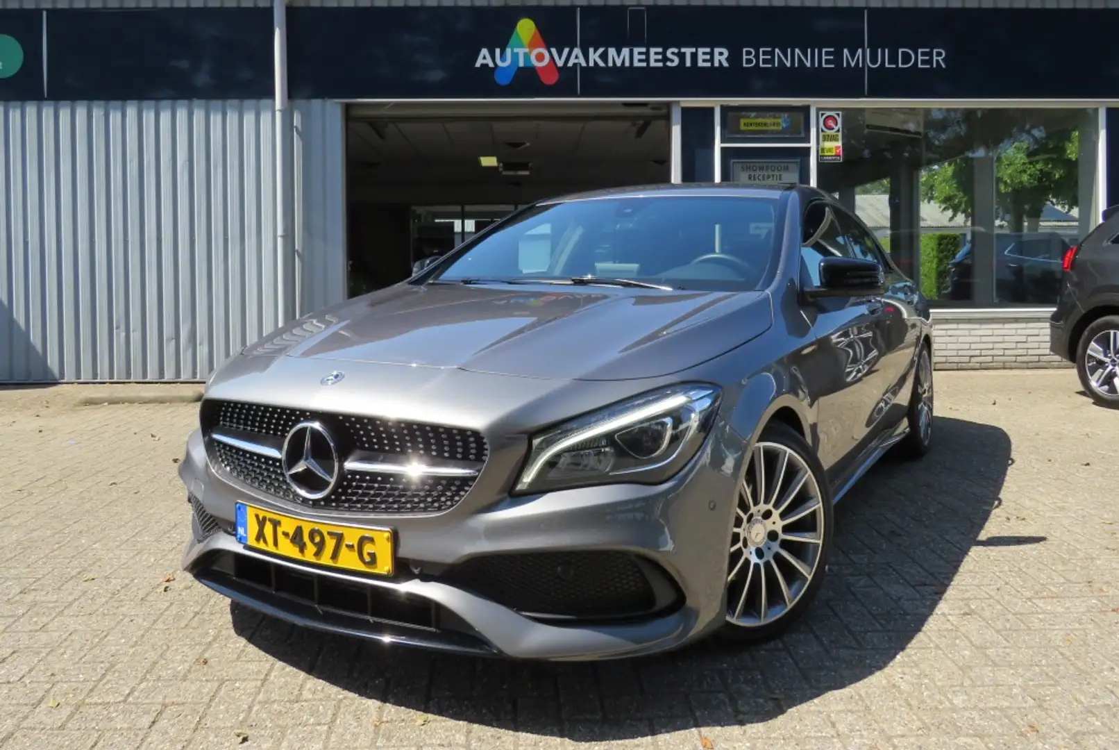 Mercedes-Benz CLA 180 AMG LINE / AUT. / CAMERA / 59.875 KM NAP Grijs - 1