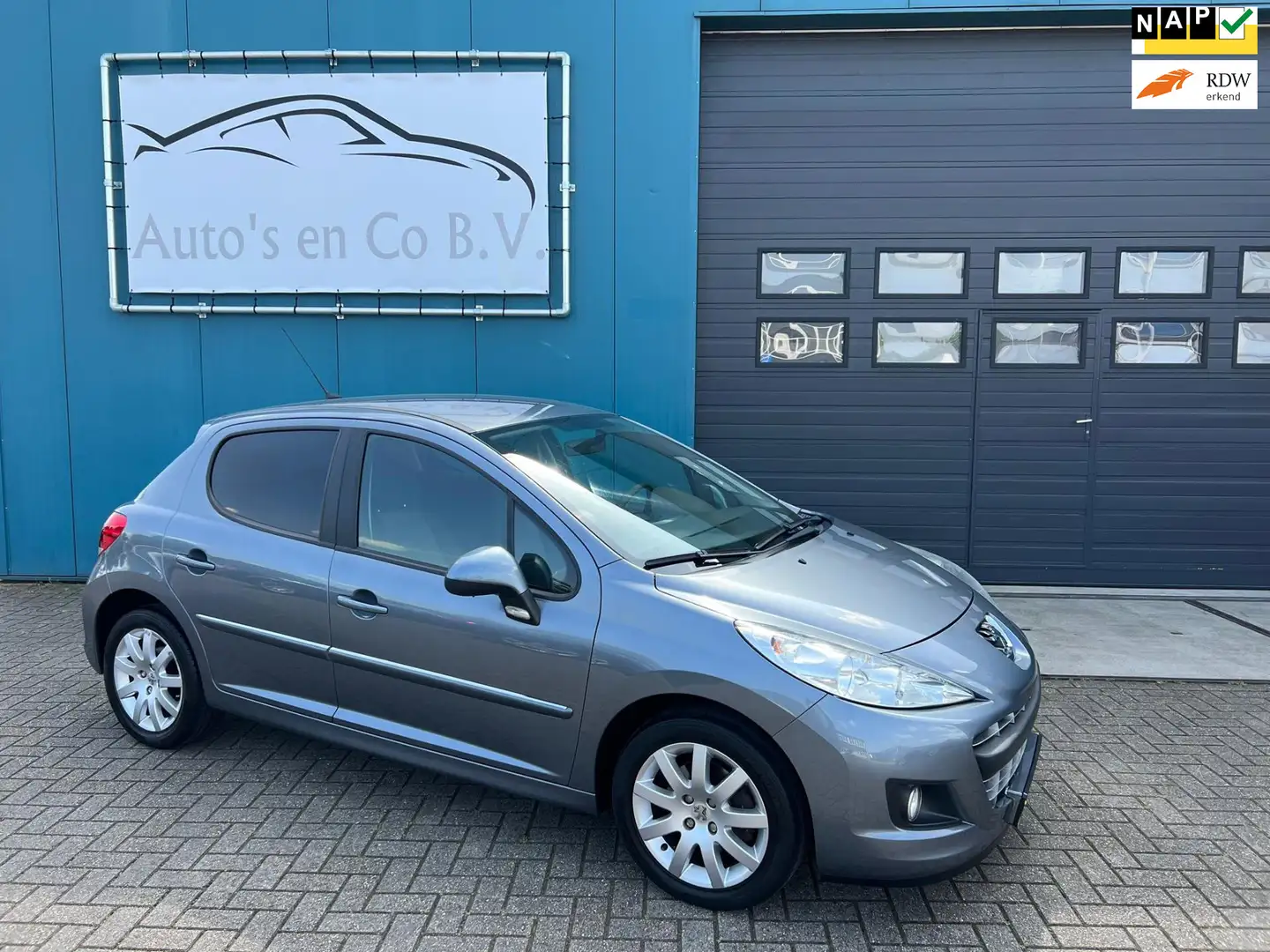 Peugeot 207 1.6 VTi Sportium 5-deurs 2e Eigenaar Airco Cruise Gris - 1