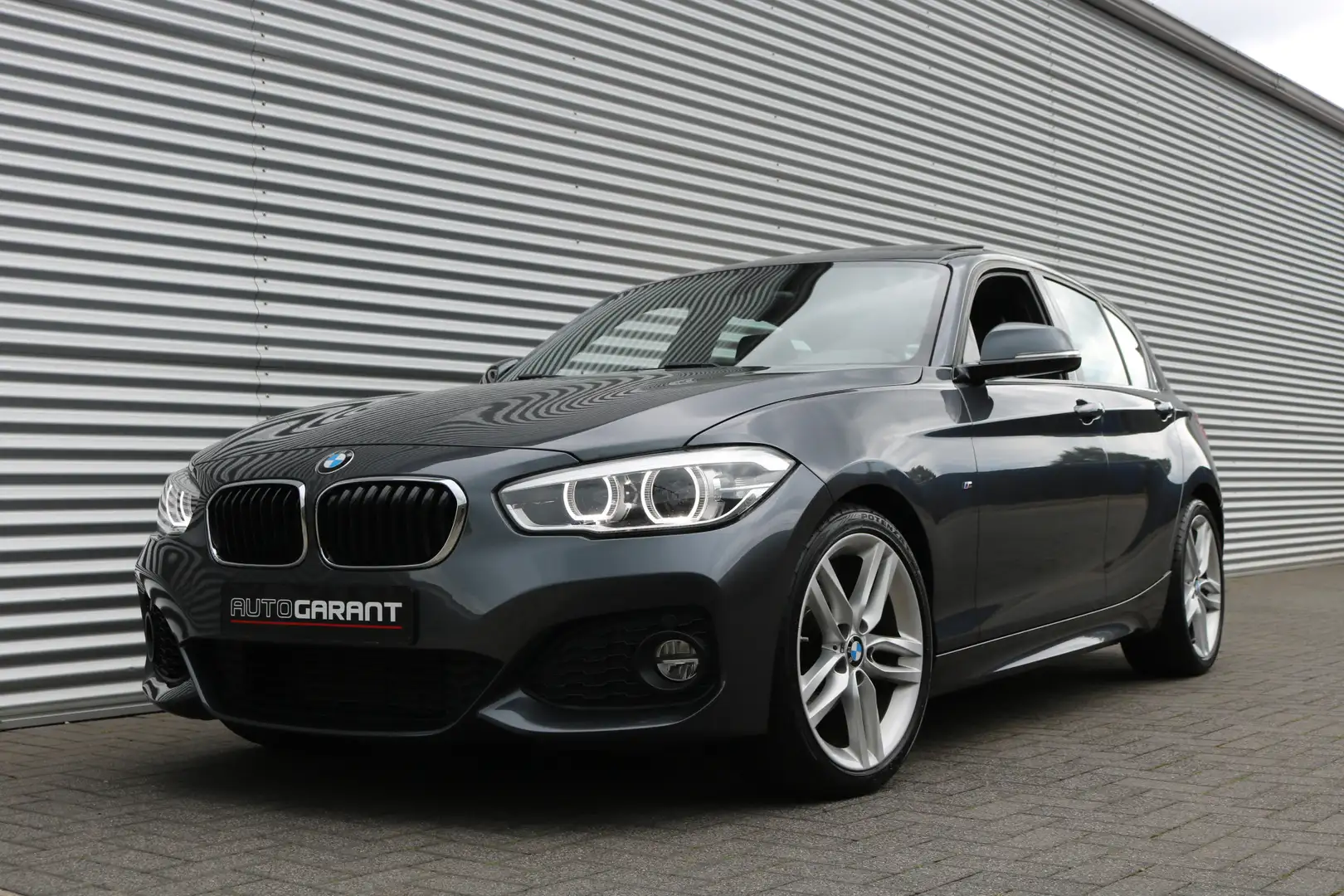 BMW 118 1-serie 118i M-Sportpakket Aut (94.384Km Orig NL A Gris - 1