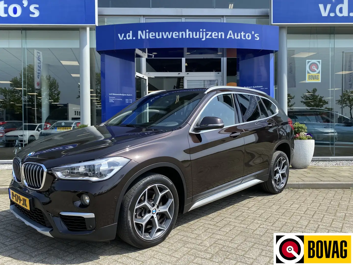 BMW X1 sDrive20i High Executive | Elektrische stoel | Cam Brun - 1