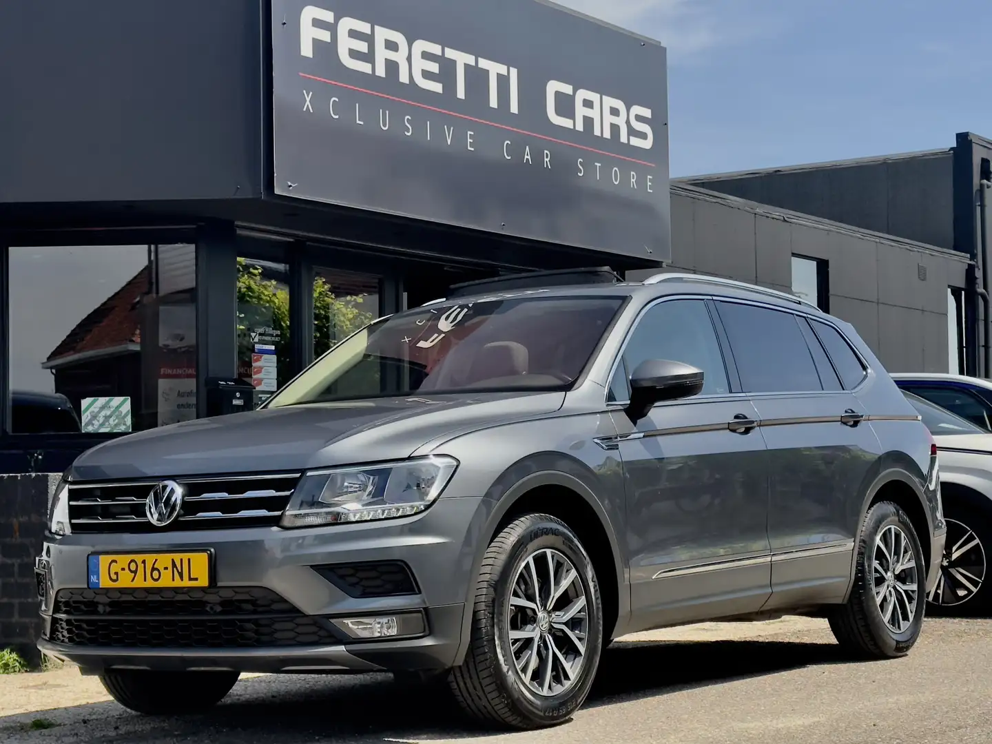 Volkswagen Tiguan Allspace 1.5 TSI AUT7 COMFORTLINE 7PRS PANODAK NAVI AIRCO A Gris - 1