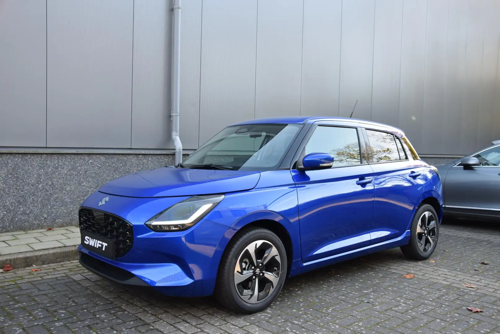 Suzuki Swift 1.2 Style Smart Hybrid | 6 jaar garantie of 150.00 Blauw - 2