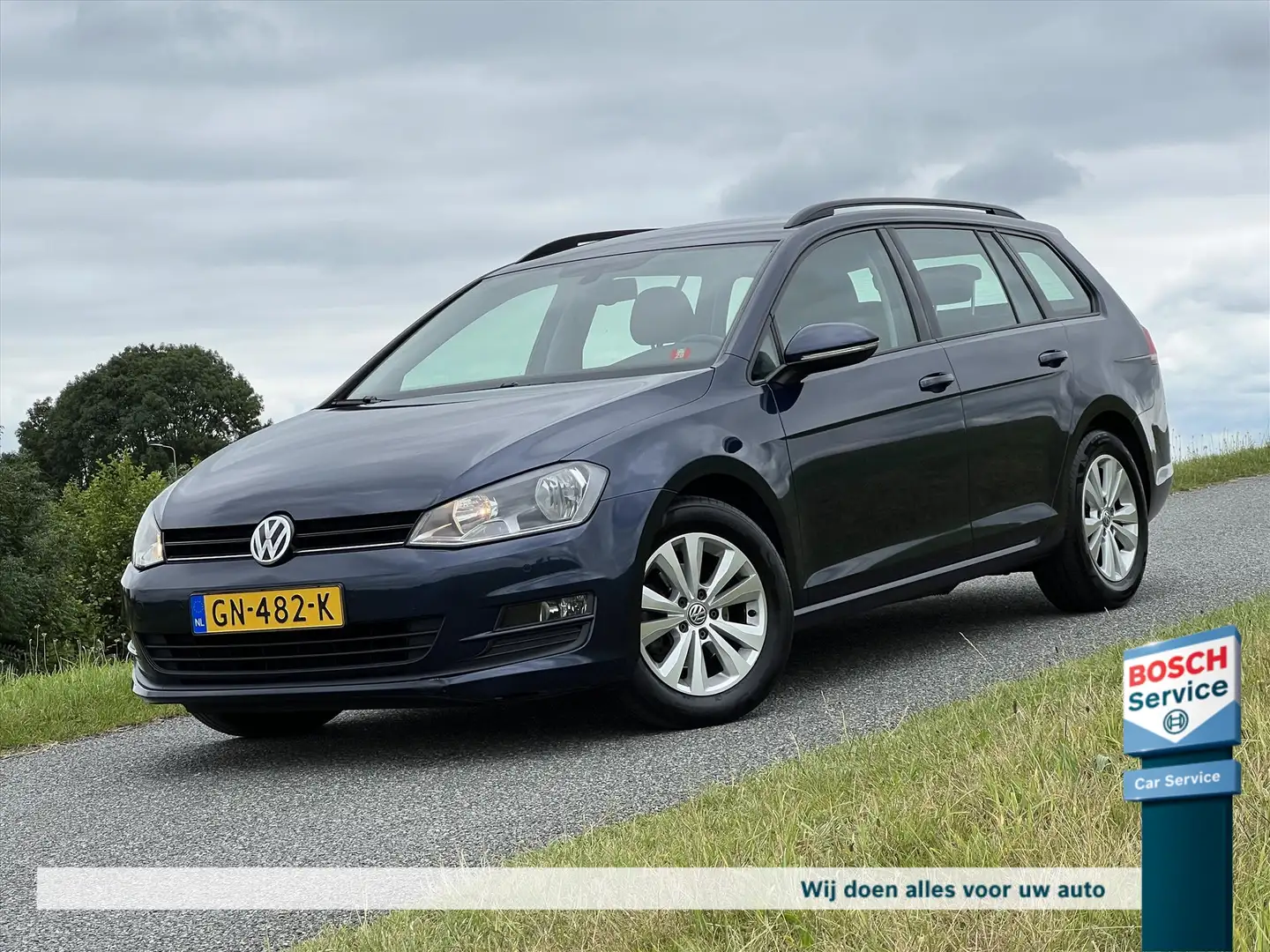 Volkswagen Golf Variant 1.6 TDI 110PK Highline DSG / Org NL / Navi / Clima Blauw - 1