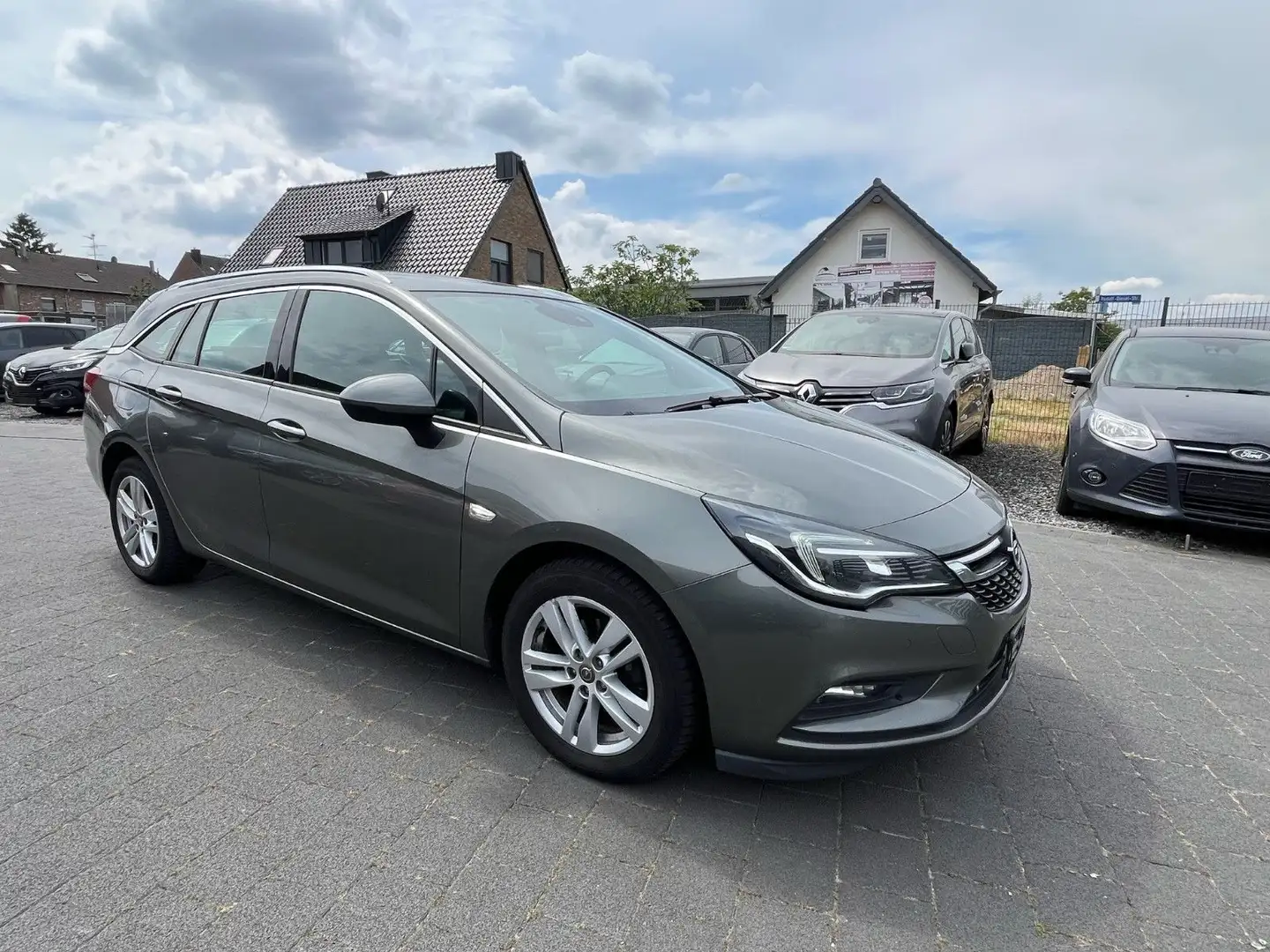 Opel Astra K Sports Tourer Active Grijs - 1