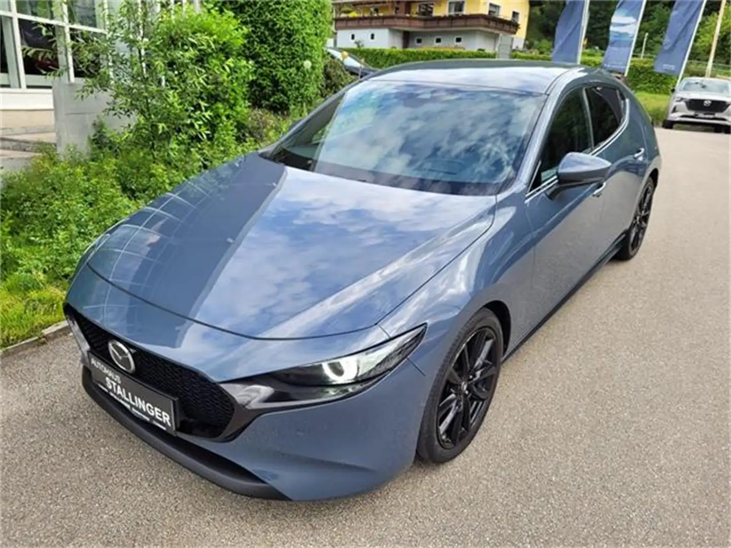 Mazda 3 Skyactiv-X180 AWD GT+/SO/PR/TE Aut. Grijs - 2