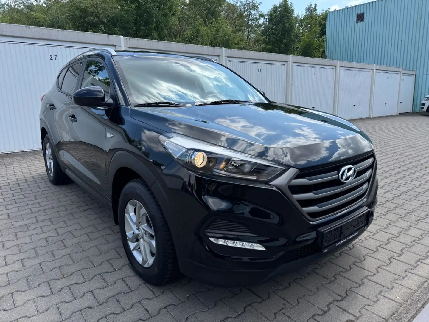 Hyundai TUCSON Style 4WD *1.Hand*Euro6*AHK*Klimaaut.* Negru - 1