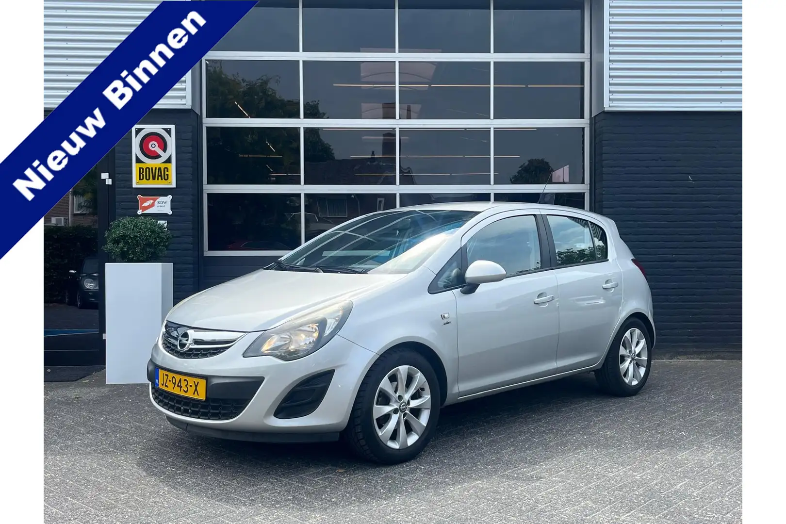 Opel Corsa 1.4-16V, Airco, Cruise, Radio, Trekhaak, 5 drs Grijs - 1