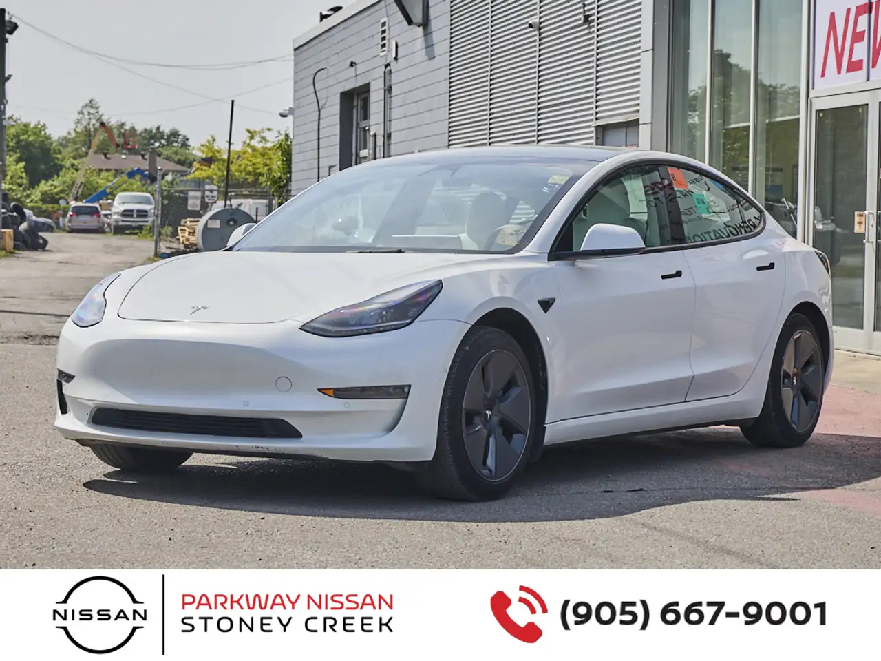 Tesla Model 3 photo Tesla Model 3