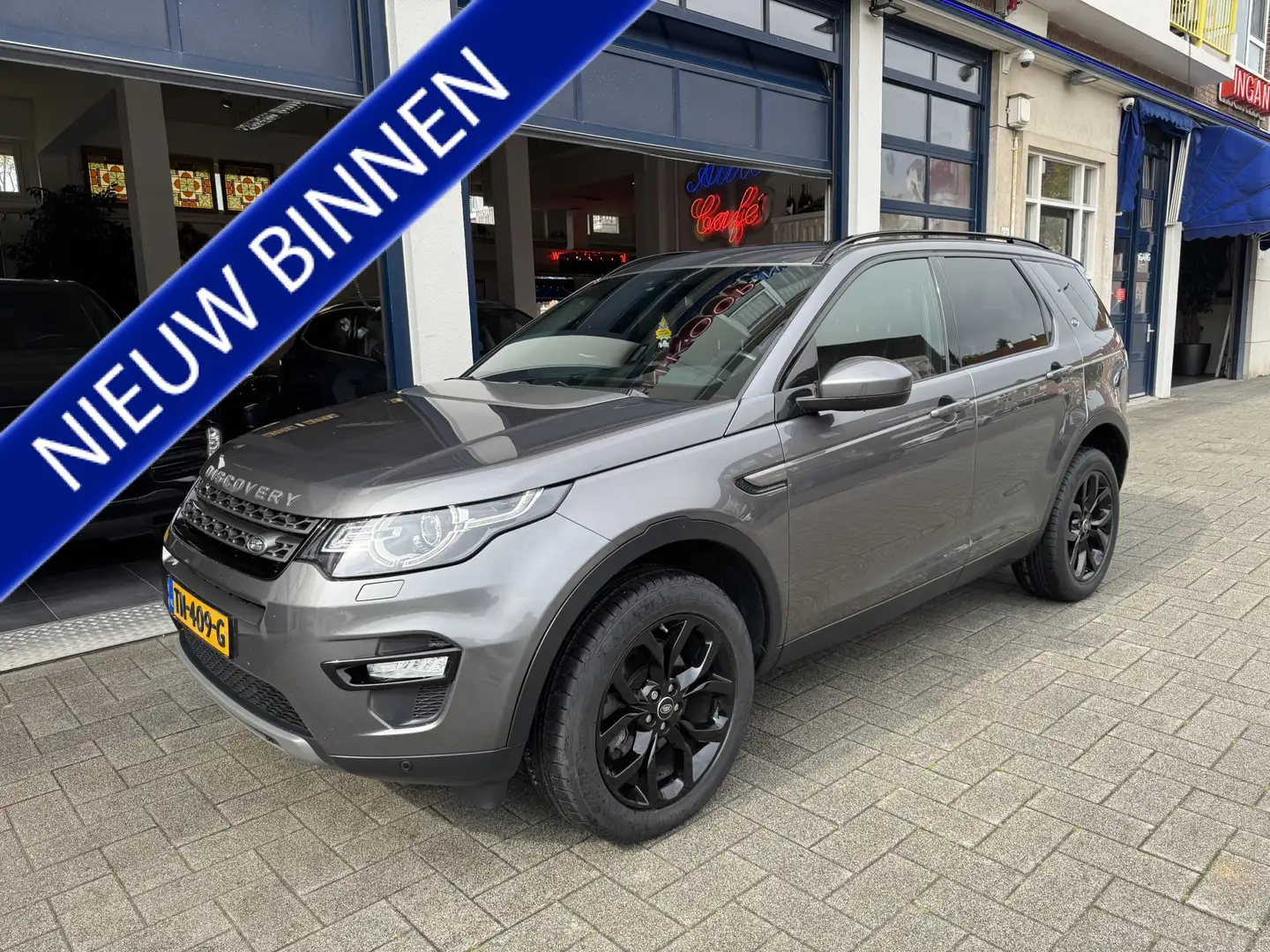 Land Rover Discovery Sport 2.0 Si4 4WD Urban Series SE Dynamic NL AUTO/PANORA Grijs - 1