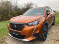 Peugeot 2008 1.2 PureTech 130 Allure NAVI.KAM.2xPDC.AHK.SHZG.Be Orange - thumbnail 2