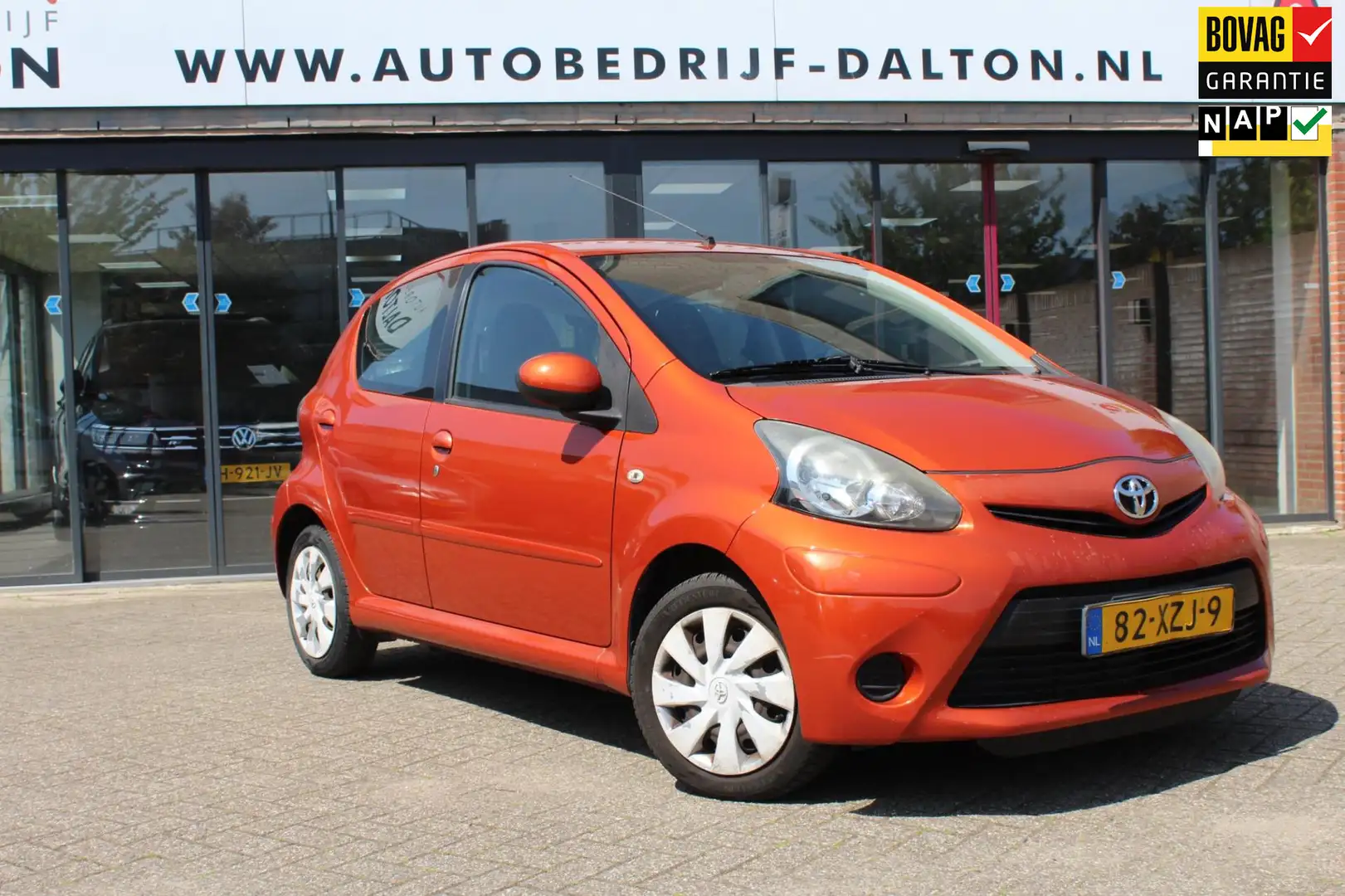Toyota Aygo 1.0 VVT-i Comfort Orange 5 DEURS / AIRCO Orange - 1