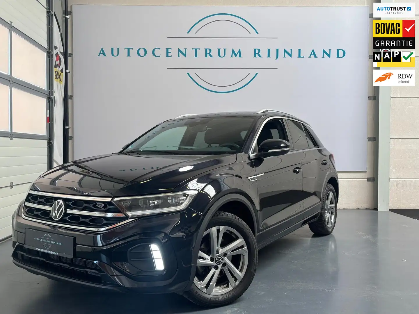 Volkswagen T-Roc 1.0 TSI R-Line Business 1 JAAR BOVAG GARANTIE Zwart - 1