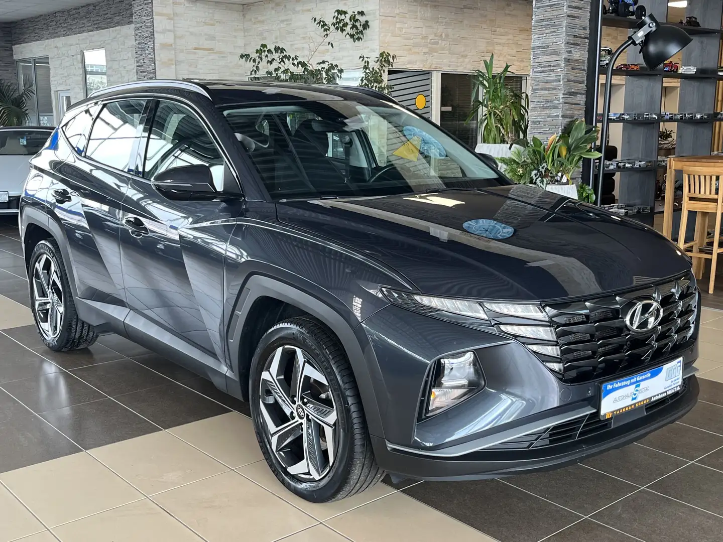 Hyundai TUCSON Hybrid 4WD Navi ACC dig.Cockpit R.Cam SHZ Schwarz - 1