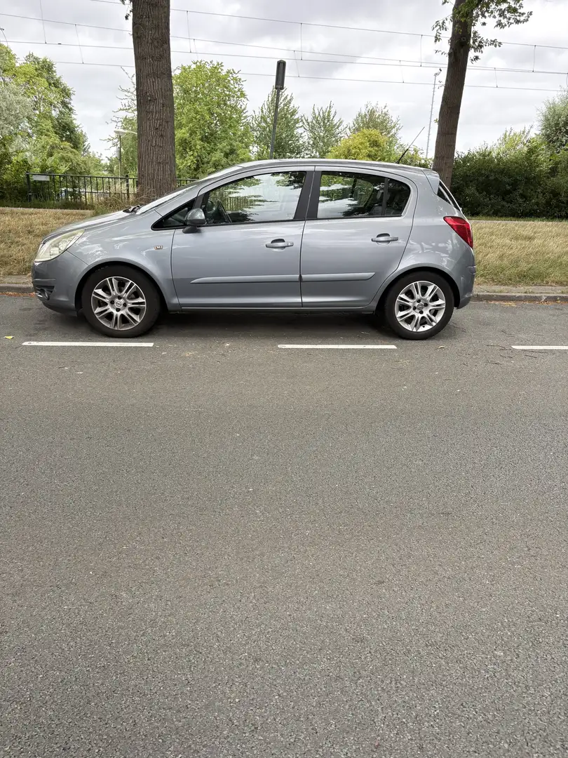 Opel Corsa 1.4-16V Cosmo Grijs - 1