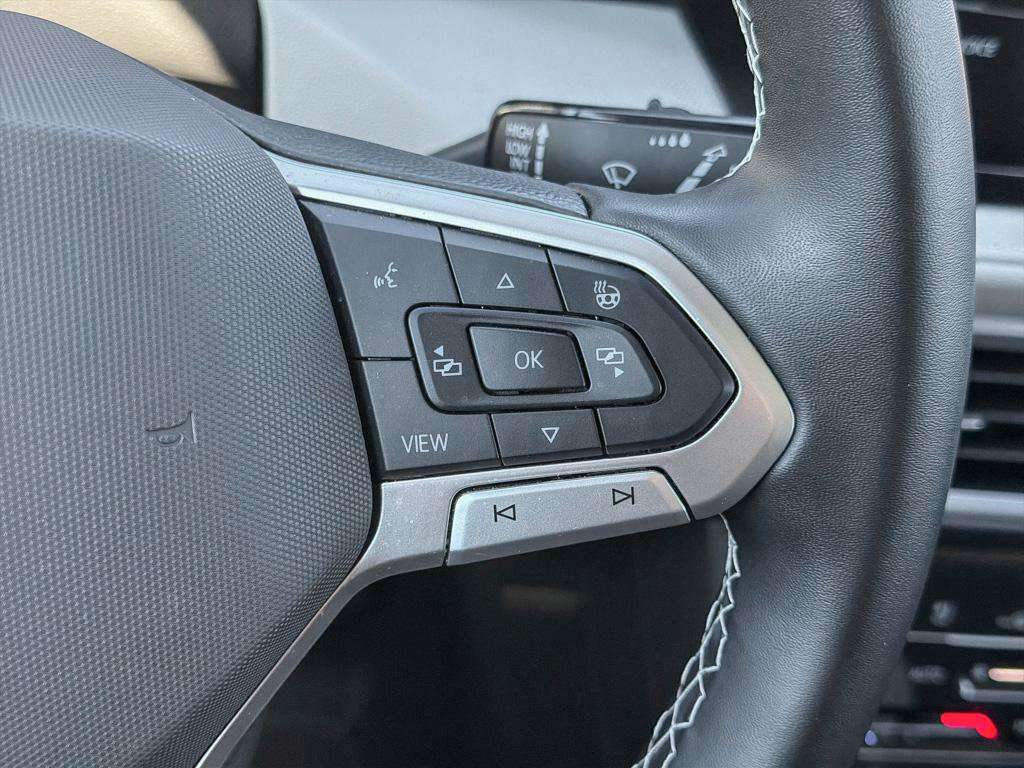 used 2025 Volkswagen Taos car, priced at $35,438