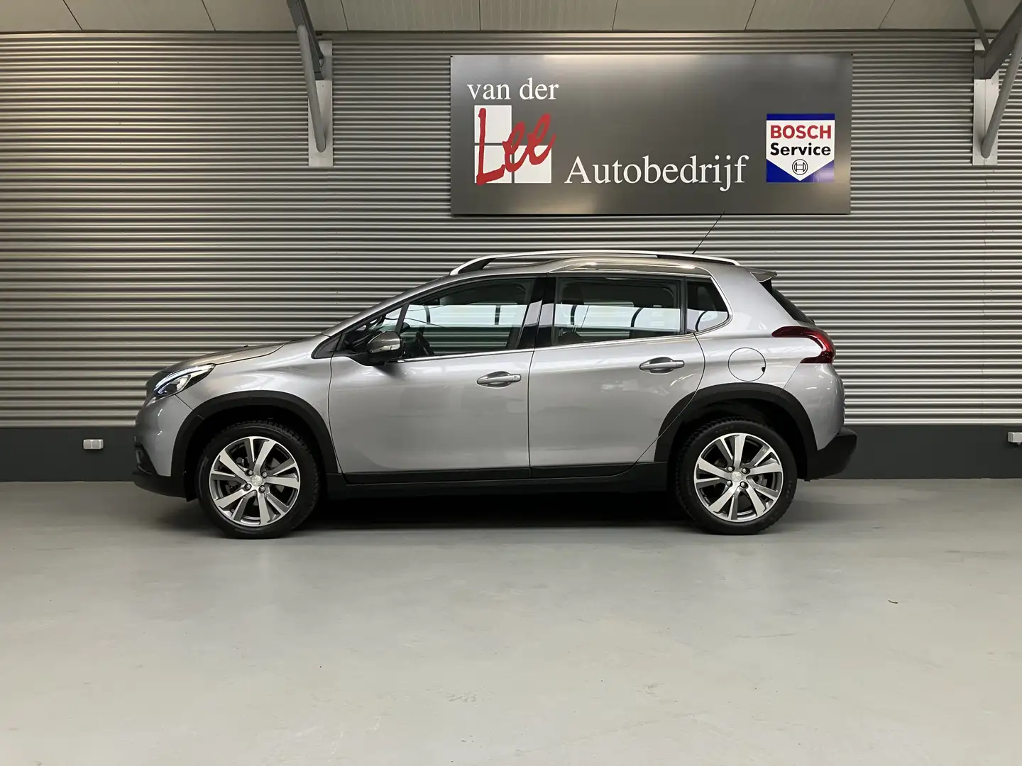 Peugeot 2008 1.2 Pure Tech/CLIMA/PDC/CRUISE/NAVI/CARPLAY/SPORTS Grijs - 2