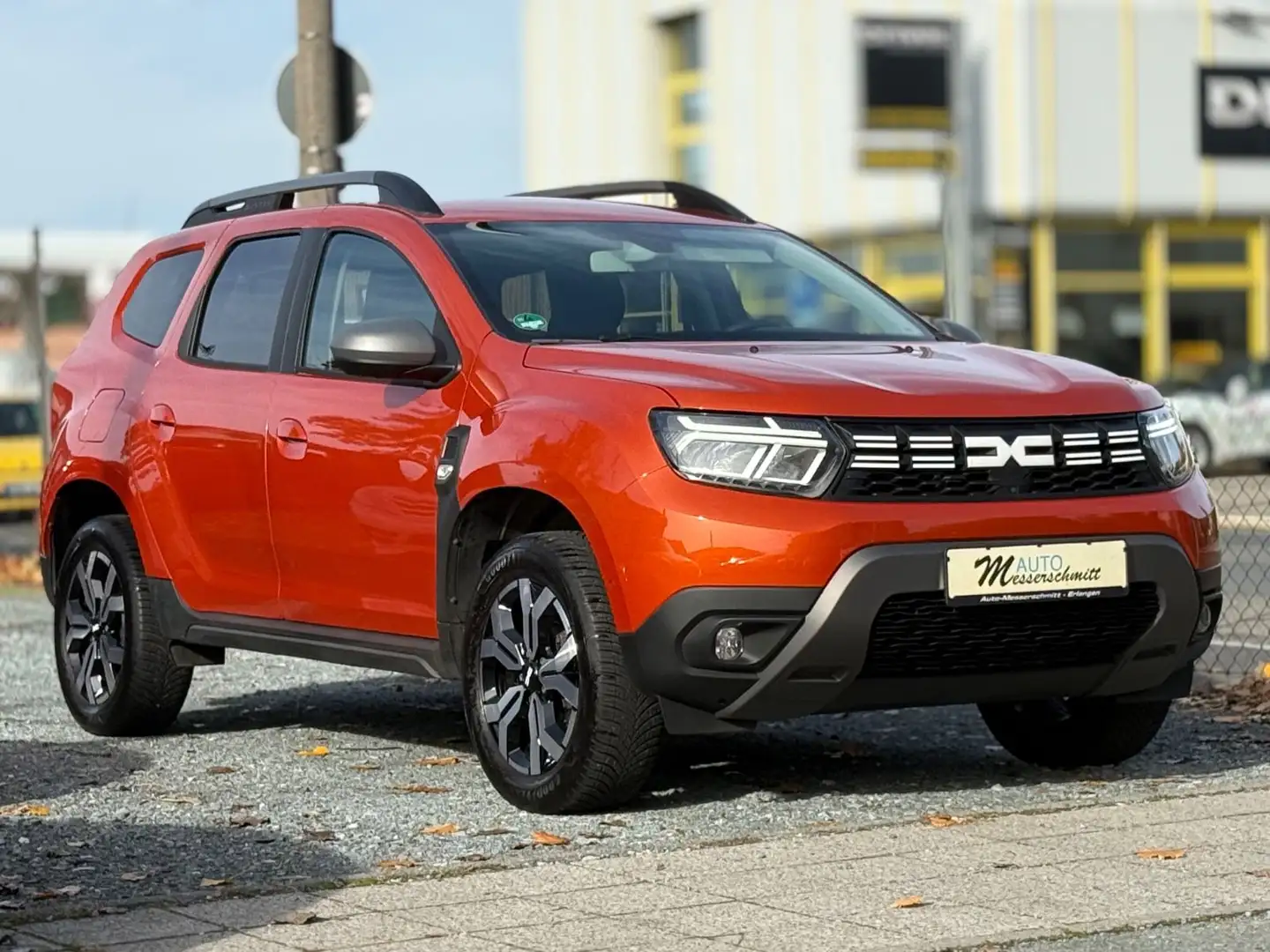 Dacia Duster II Journey+ 4WD AHK LED NAVI 360CAM Orange - 1