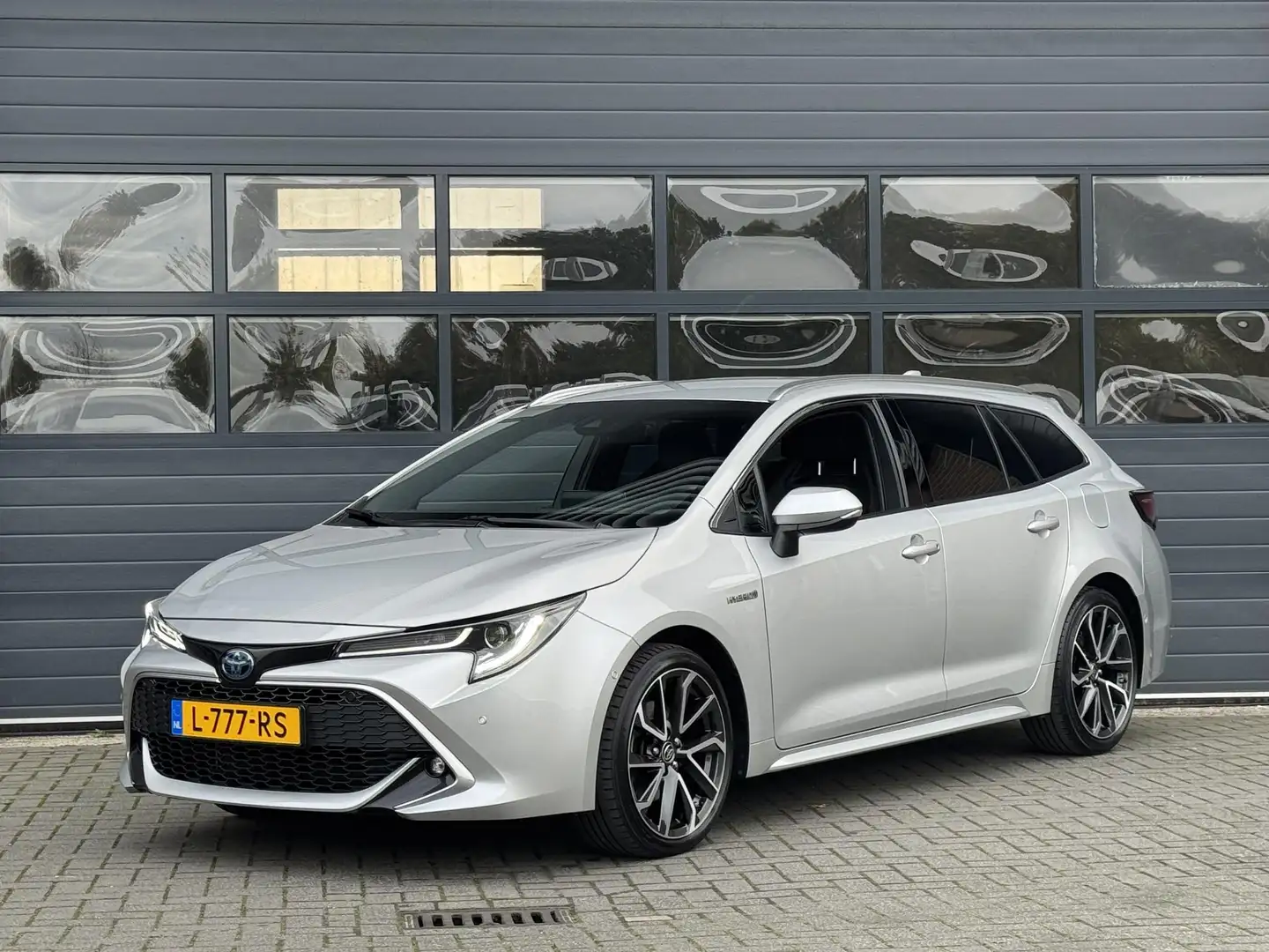 Toyota Corolla TOURING SPORTS 2.0 HYBRID EXECUTIVE I DEALER ONDER Grau - 1