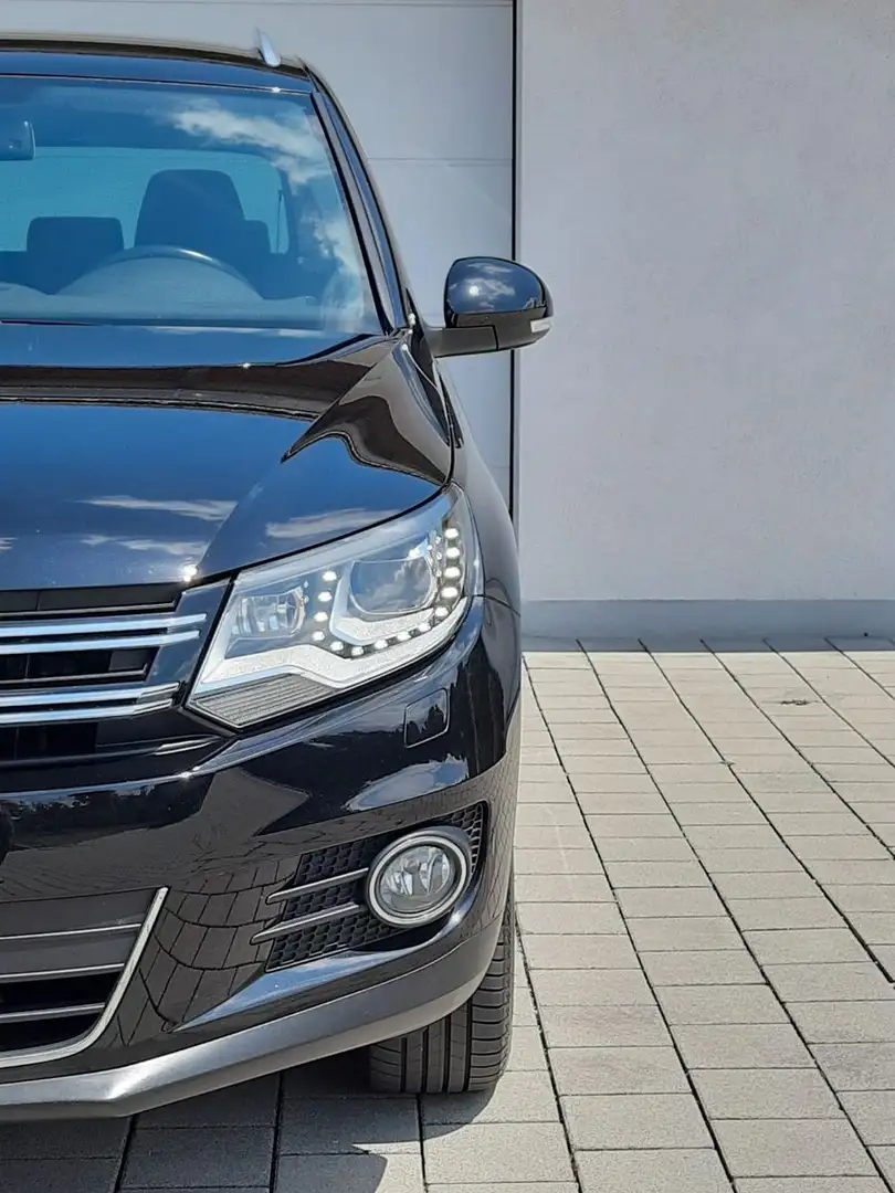 Volkswagen Tiguan Sport & Style 4Motion/Bi-Xenon/AhK/StdH. Schwarz - 1