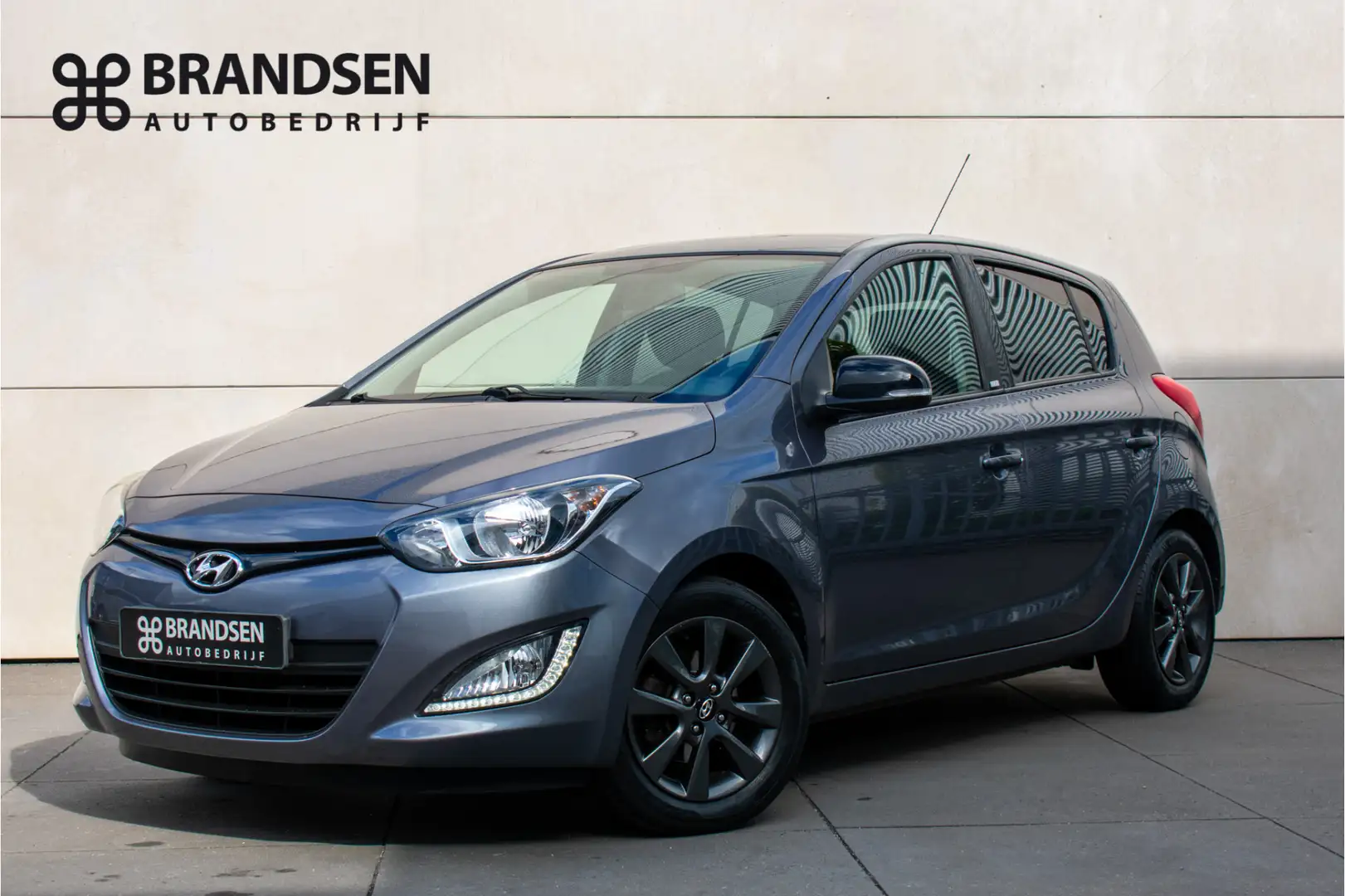 Hyundai i20 1.2i i-Catcher -Schuifkantel dak-15"-Airco Gris - 1