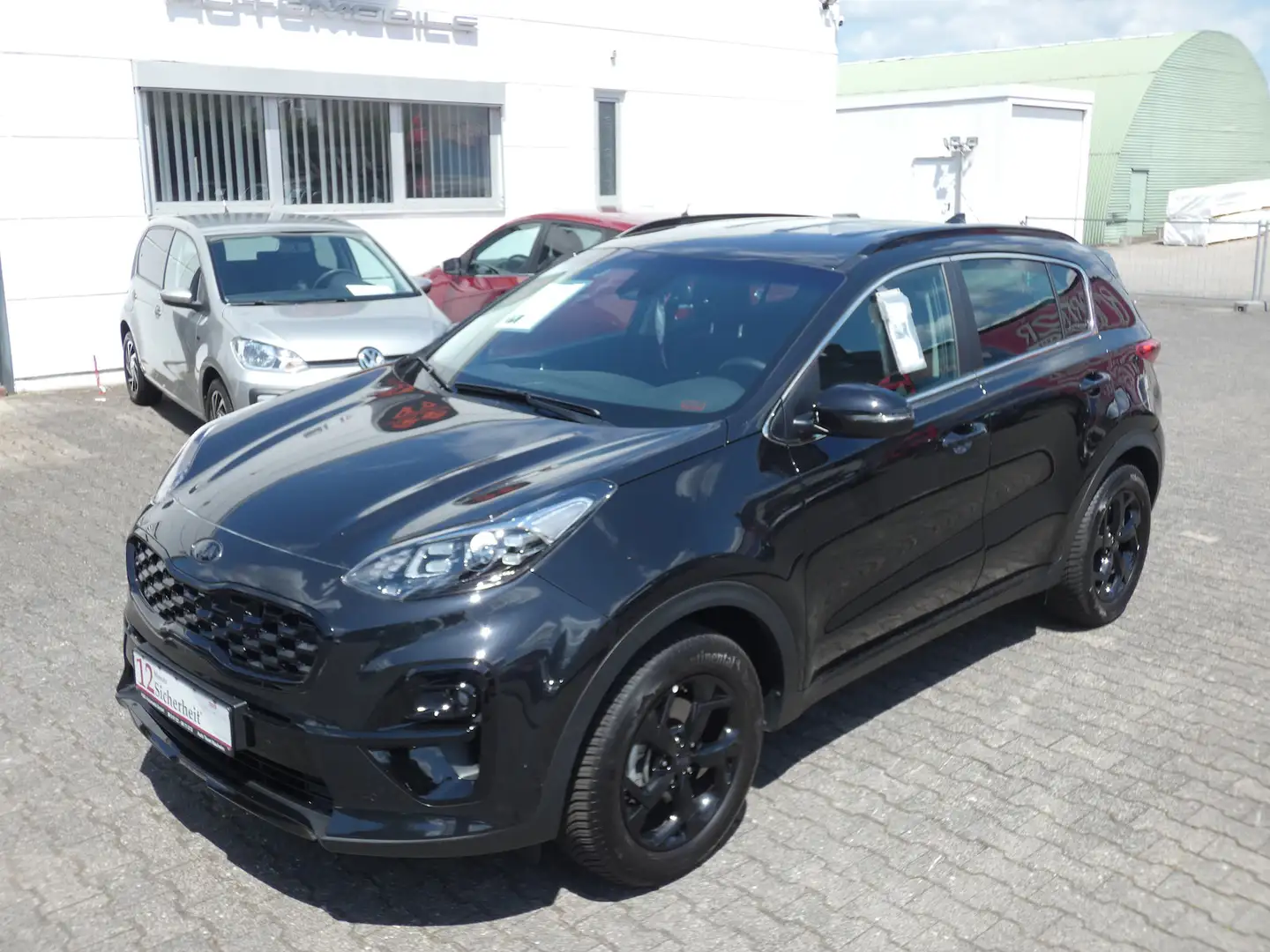 Kia Sportage Black Edition 4WD Automatik *NAVI*ALU* Schwarz - 2