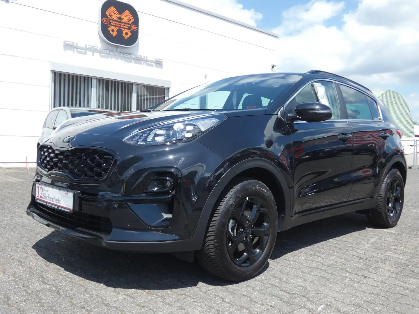 Kia Sportage Black Edition 4WD Automatik *NAVI*ALU* Schwarz - 1