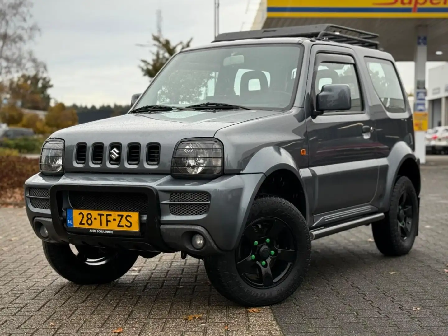 Suzuki Jimny 1.3 EXCLUSIVE AIRCO Grijs - 1