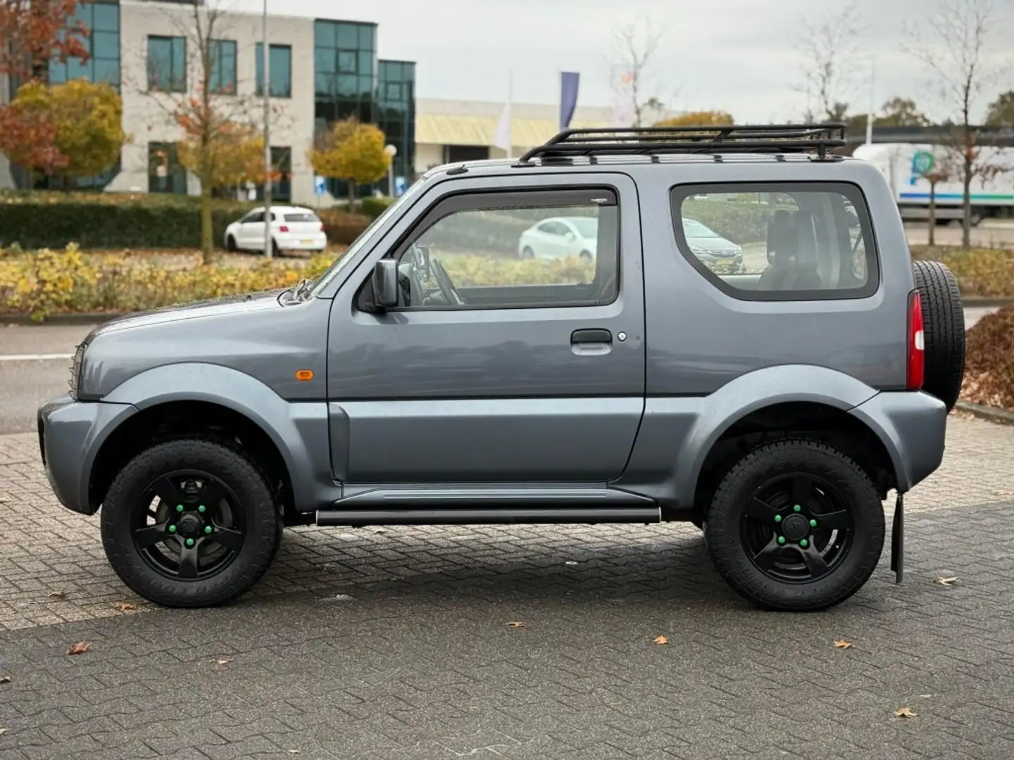 Suzuki Jimny 1.3 EXCLUSIVE AIRCO Grijs - 2
