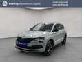 Skoda Karoq 2.0 TDI SCR 4x4 DSG Sportline Grijs - thumbnail 1