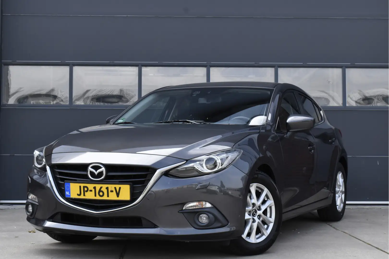 Mazda 3 2.0 TS+ Navi - Trekhaak - Cruise - NAP Grijs - 1