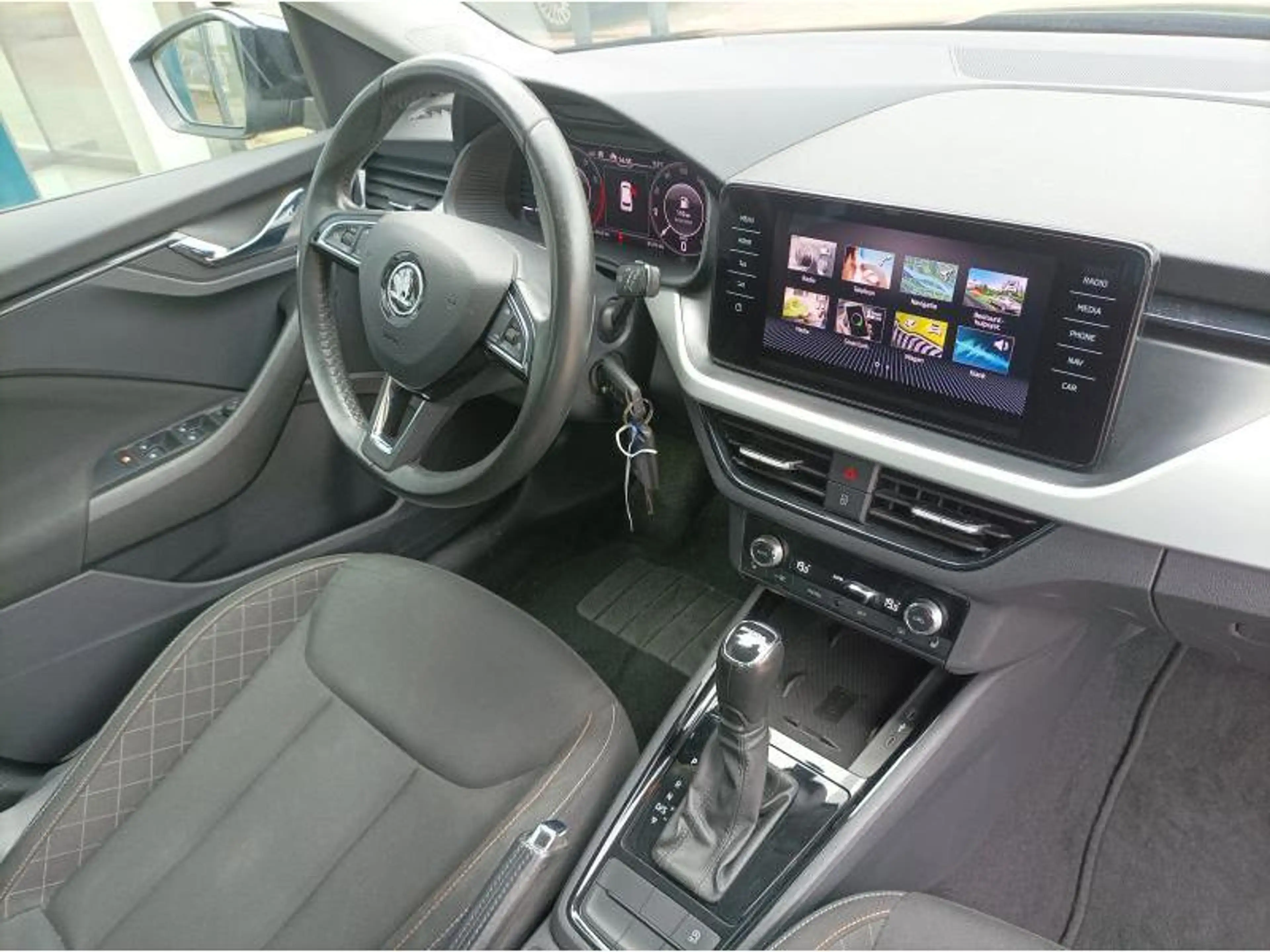 Skoda Kamiq Ambition — photo 12