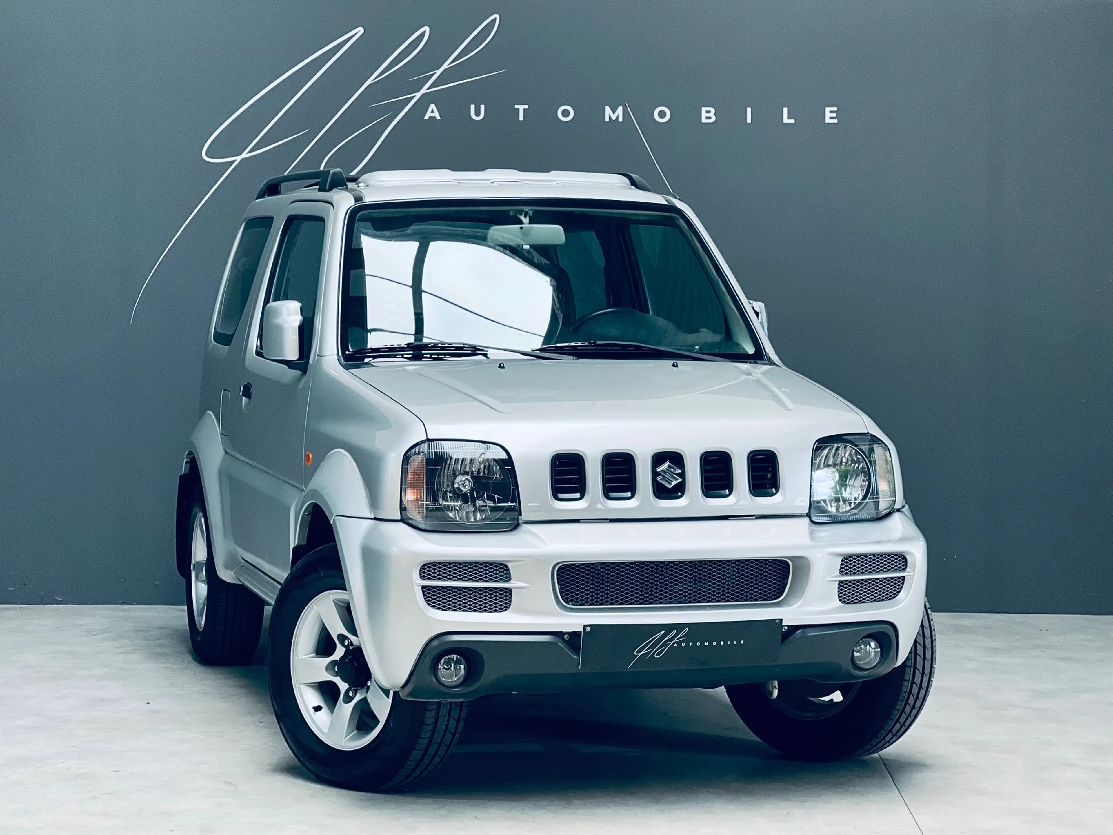Suzuki Jimny 1.3i **CLIMATISATION**TOIT OUVRANT**