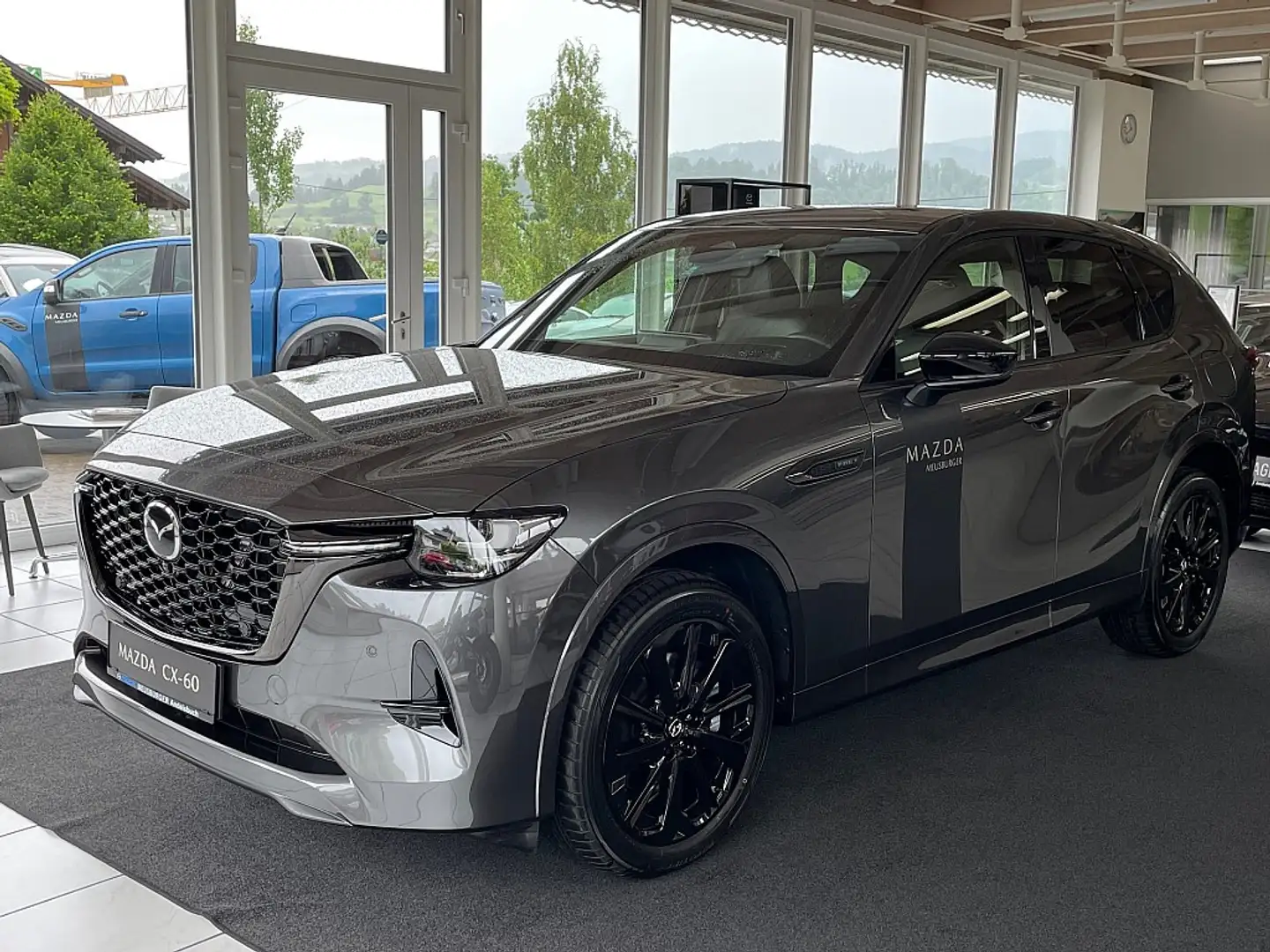 Mazda CX-60 2.5L e-SKYACTIV PHEV AWD HOMURA Aut. PANORAMA Grau - 1