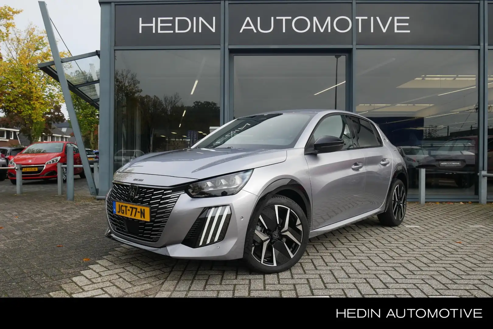 Peugeot 208 1.2 Hybrid 145 e-DCS6 GT Nieuw uit voorraad | Rijk Gris - 1