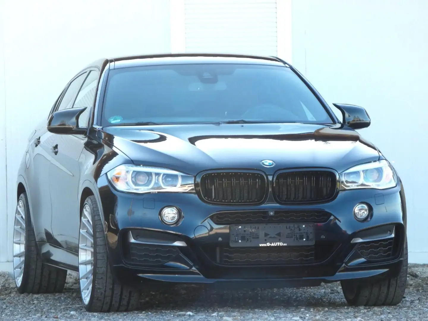 BMW X6 M50 d Noir - 1