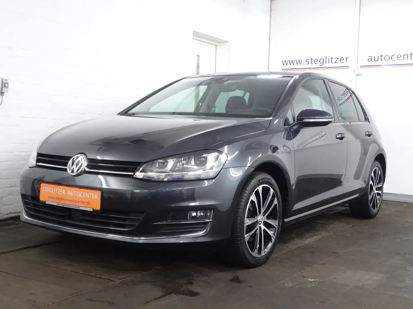 Volkswagen Golf VII Lim. 1.4 TSI Allstar DSG ACC/Navi/Xenon/PDC/TW Grau - 1