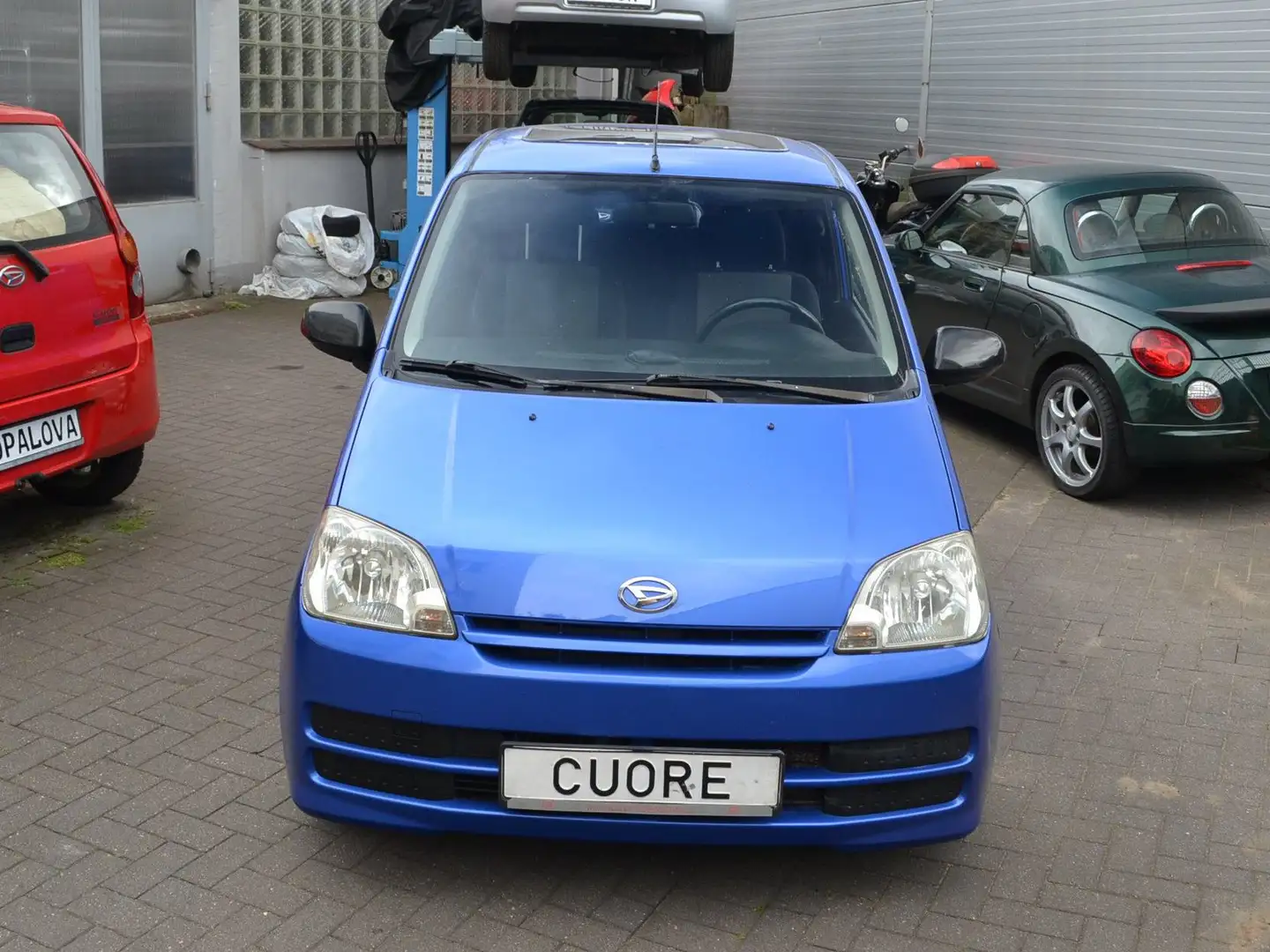 Daihatsu Cuore Cuore 1.0 Plus Allwetterreifen E.Glasdach Tüv N Bleu - 1