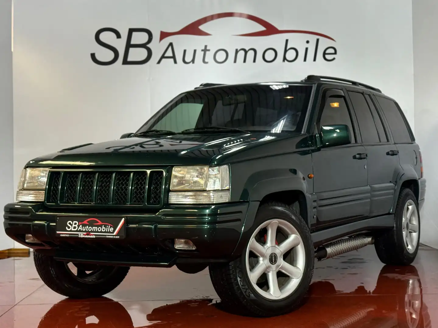 Jeep Grand Cherokee 5.9i V8 LIMITED PORSCHE ÉDITION MAGNUM/GARANTIE - 1