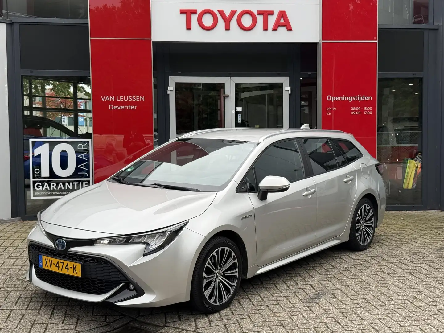 Toyota Corolla Touring Sports 2.0 Hybrid First Edition NL-AUTO TR Grijs - 1