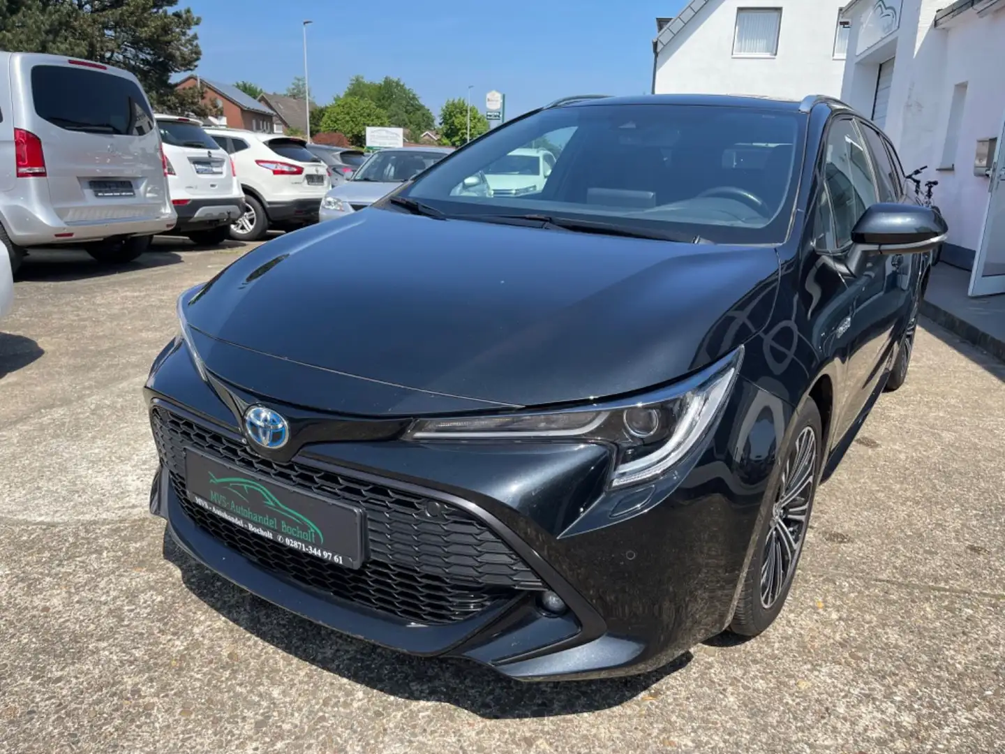 Toyota Corolla 1,8 Hybrid Touring Automatik Sports  Club Schwarz - 1